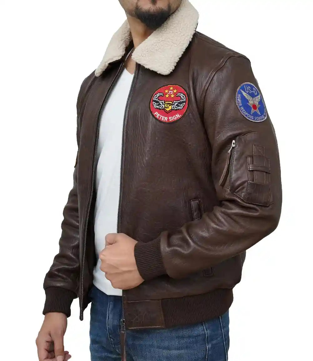 Brown leather jacket with patches on a white background