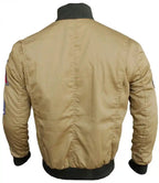 Beige bomber jacket with patches on a white background