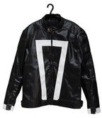 Black leather jacket with white geometric design on a hanger against a white background
