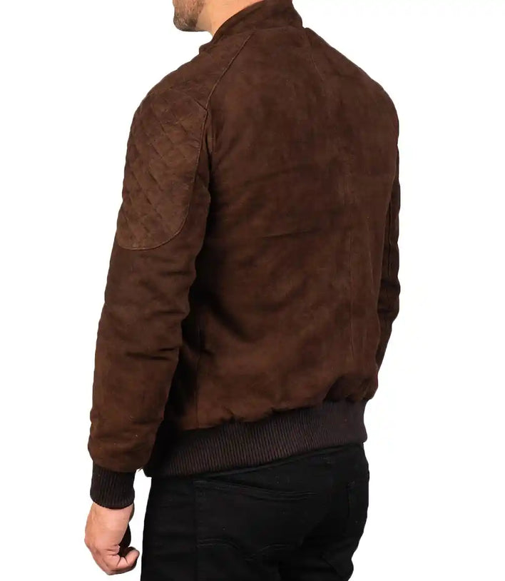 Brown suede jacket worn by a person on a white background