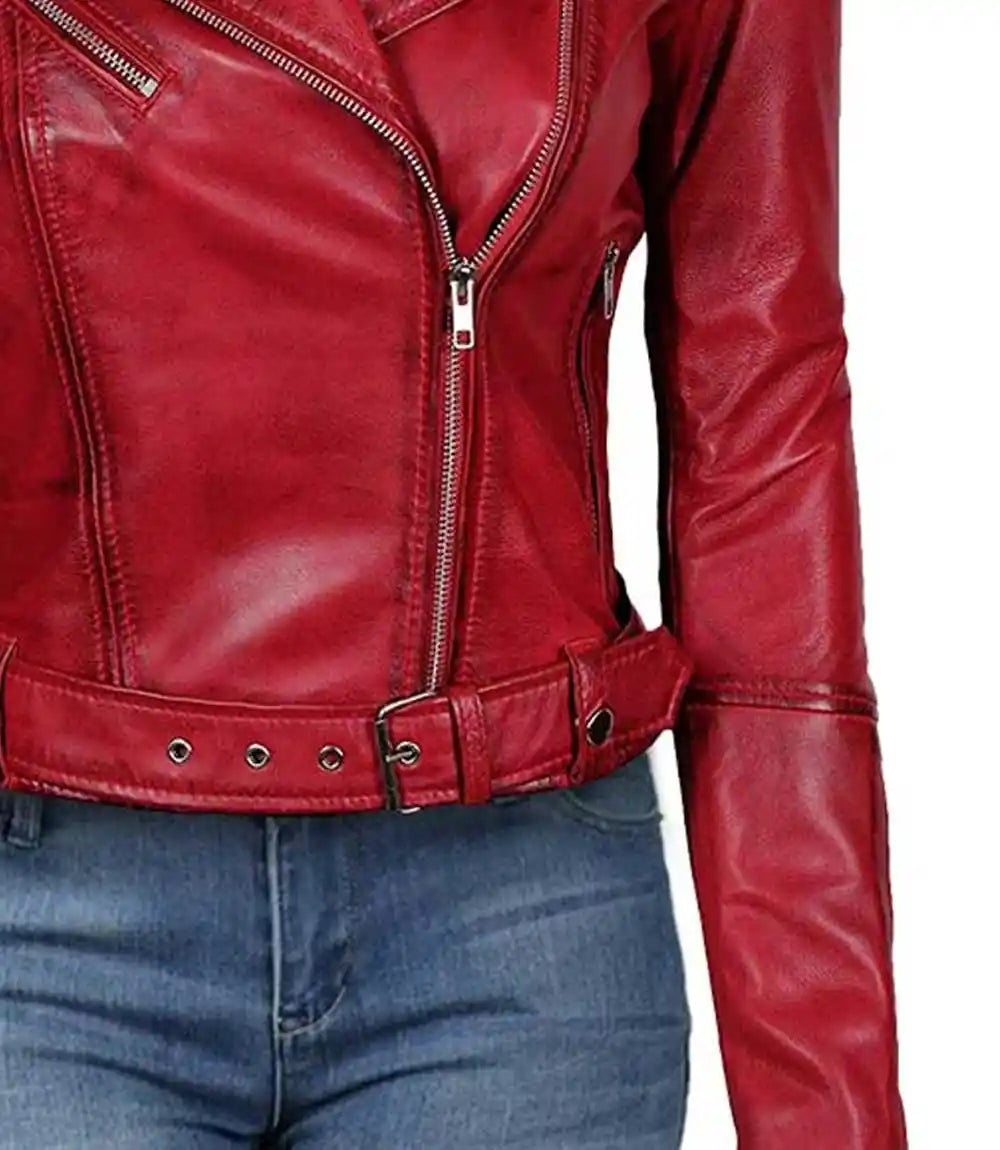 Red leather jacket worn with blue jeans on a white background