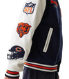 Navy and white varsity jacket with NFL and Chicago Bears logos on a white background