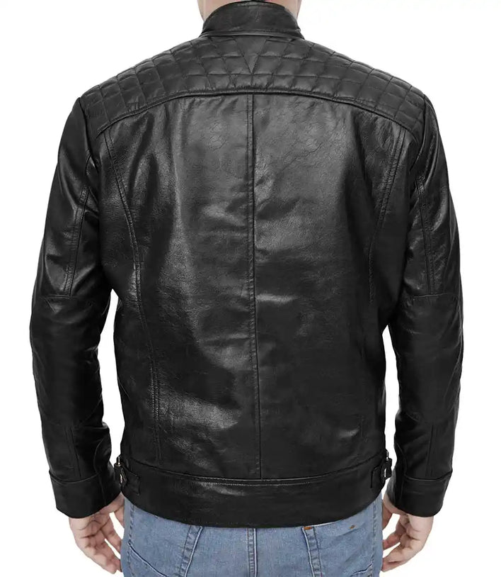 Black leather jacket worn by a person on a white background